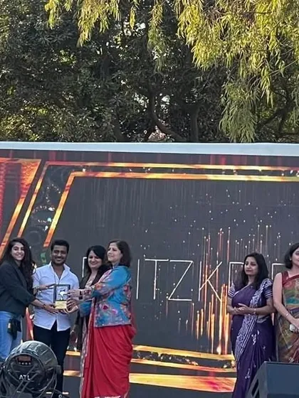 A proud moment receiving an award for my contributions to dance. It is always rewarding to be recognized for the work I am so passionate about.