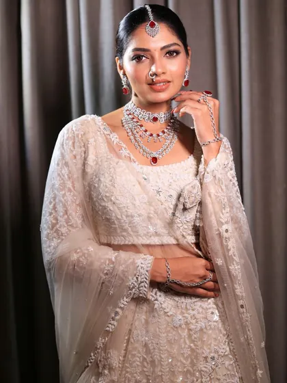 Another shot of this beautiful bride, her smile radiating happiness. The makeup enhances her features, making her look like the best version of herself.