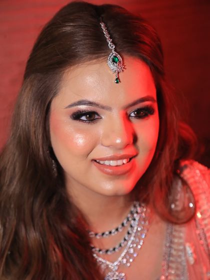 A close-up of the engagement glam, focusing on the bright, happy smile.