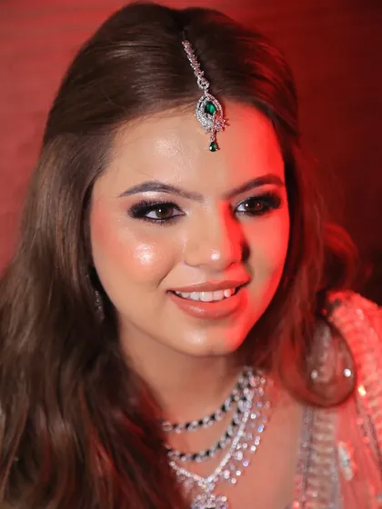A close-up of the engagement glam, focusing on the bright, happy smile.