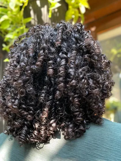 This is what I call hair goals for men. These luscious, defined curls are the result of a great haircut and a simple styling routine.