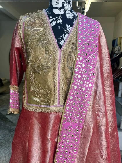 A close-up of the mirror work on the dupatta.