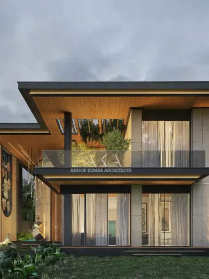 A wider view of the nature-inspired farmhouse, showing its placement within a lush landscape. The design's clean lines and natural materials help it blend seamlessly with the environment.
