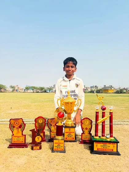 Rishabh Singh showcasing his impressive haul of trophies from the tournament. A true champion in the making.