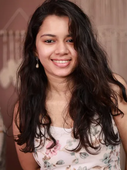 A simple, natural headshot with loose hair and a genuine smile. Sometimes the most simple shots are the most beautiful.