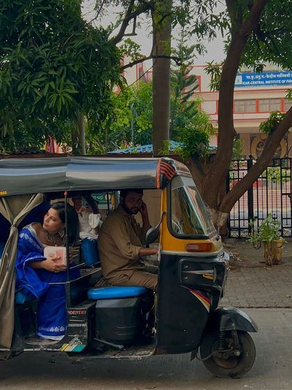 An auto ride in style. This shot proves that you can make a fashion statement anywhere, anytime.