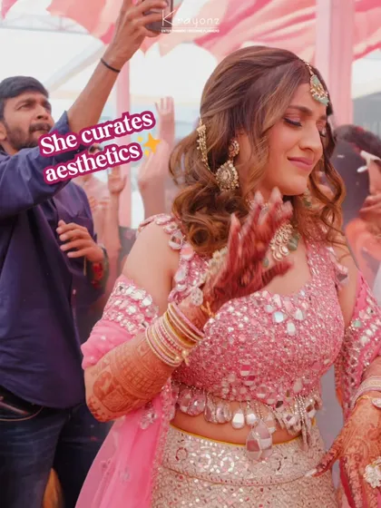 "She curates aesthetics... he ruins them." A playful look at the couple's dynamic during their fun-filled and messy pink Haldi ceremony.