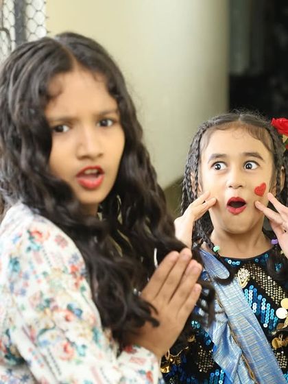 A candid moment backstage, capturing the excitement and nerves before a performance.