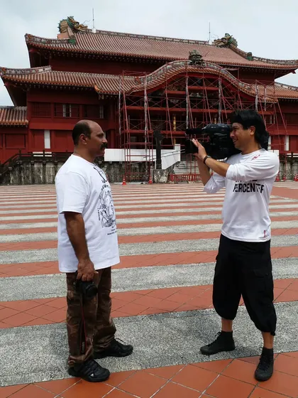 During a media interview in front of the iconic Shuri Castle in Okinawa. We are often asked to share our story and our dedication to traditional karate.