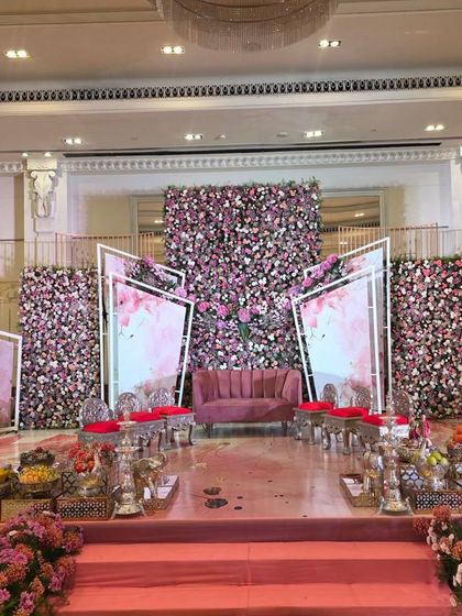 A wide view of the modern pink stage, showing the full setup with seating.