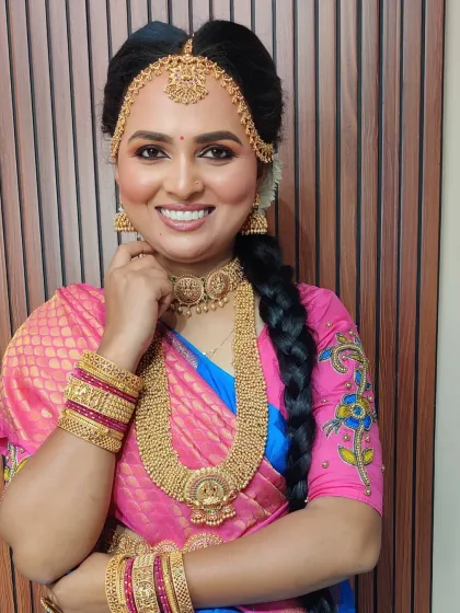 A radiant smile completes this traditional Iyer Madisar look. My goal is to make you feel comfortable and joyful in whatever style you choose.