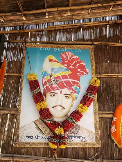 A portrait of Om Banna, whose spirit is believed to protect travelers. Documenting local legends and beliefs is a core part of my cultural coverage.
