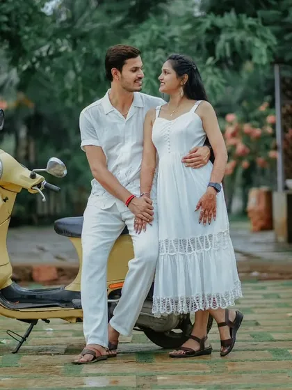 A classic romantic pose with a retro scooter. This photo of Suchita and Om Prakash is perfect for a couple looking for a fun and unique pre-wedding theme.
