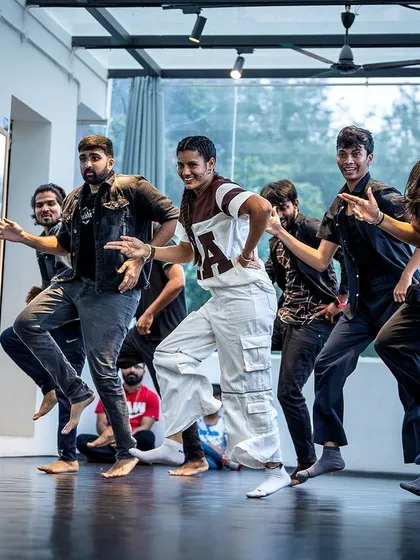 Another angle of the group performance, showing the energy from a different perspective.