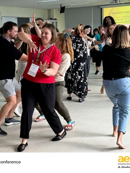 Joyful learning isn't just for students. Our educators engage in a Dalcroze Eurythmics session, exploring the connection between music, movement, and the brain.