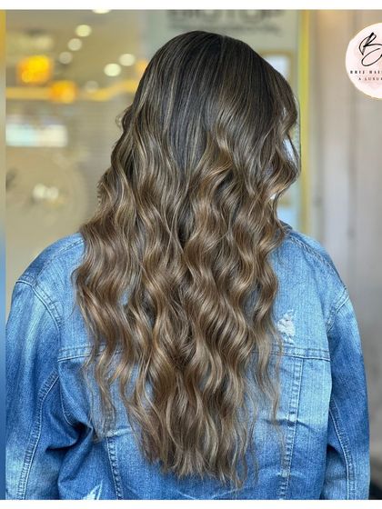 Elegance woven in hues of neutral brown, a timeless allure that is both soft and striking.