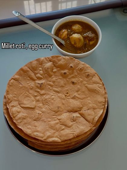 Millet roti served with a hearty egg curry. This meal is a great example of a high-protein, gluten-free option that is both filling and nutritious.