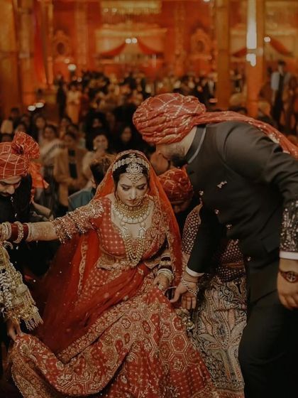 A candid shot from the wedding ceremony. The atmosphere is so full of tradition and emotion.