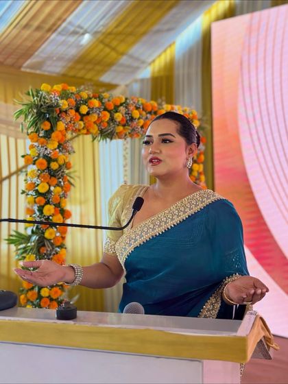 Speaking passionately at the Naman launch. I use expressive gestures to convey the excitement and potential of the new venture.