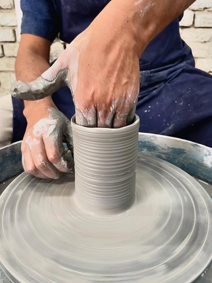 A close-up of the process. Creating those clean, even lines on a cylinder takes patience and a steady hand. It's so satisfying to watch the form take shape.