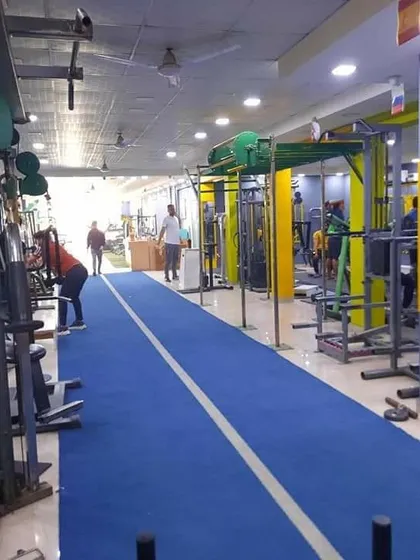 This perspective shows the full length of our indoor turf track, a unique feature for sprints, lunges, and sled pushes regardless of the weather outside.