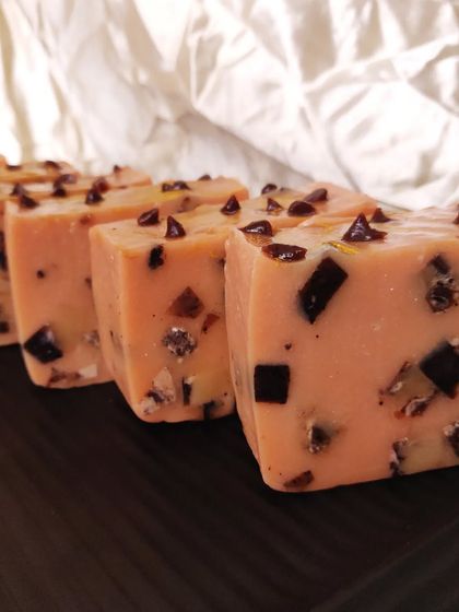 This is a re-batched cold process soap, which is the most nourishing soap I have ever made. It's incredibly rich and creamy, perfect for dry skin, and has a rustic, artisanal look with chunks of darker soap inside.