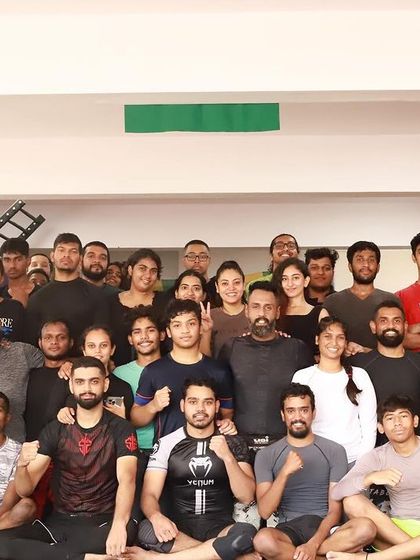 The entire group of competitors and supporters from our in-house tournament. The sense of community is what fuels our success.