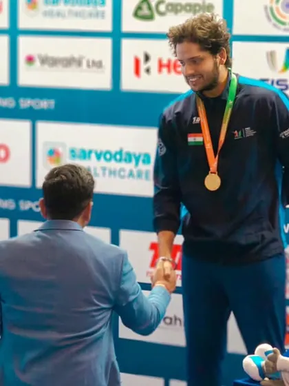An Indian shooter receives his Gold medal in the Final Skeet Men event. We take pride in creating platforms where individual brilliance is recognized and rewarded.