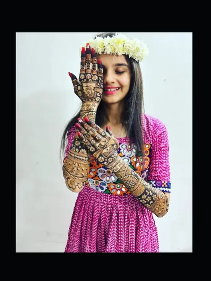 A shy smile and beautiful henna. Capturing these moments of happiness is what makes my job so special.