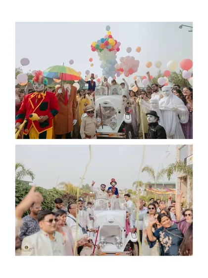 The grand, carnival style entry of Mani and Monika at their Jim Corbett haldi. The auto rickshaw, clowns, and colorful balloons set the tone for a fun and unique celebration.