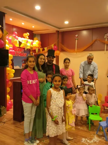 A lovely family photo after a birthday party performance. I am happy to pose with the birthday child and their family to capture the memory.