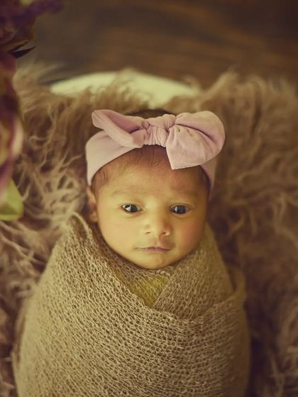 Another adorable awake moment, this little one is looking curiously at the camera.