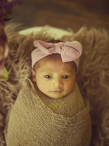 Another adorable awake moment, this little one is looking curiously at the camera.