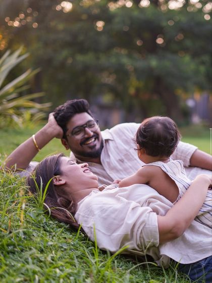 The best photos happen when you are just being yourselves. Lying in the grass, sharing a laugh, and forgetting the camera is even there allows me to capture the true essence of your family's bond.