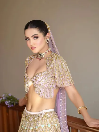 Another angle of the stunning Papa Don't Preach creation, highlighting the unique blouse design and the delicate craftsmanship.