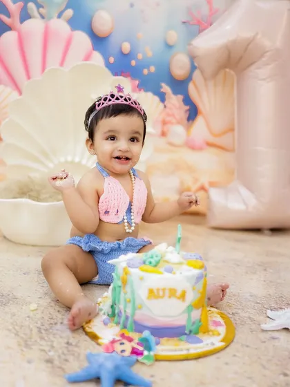 A magical mermaid-themed cake smash to celebrate a very special first birthday. I love creating custom setups to make your baby's big day unforgettable.