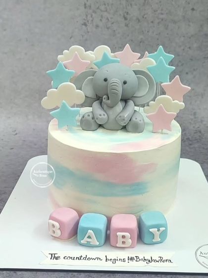 Another version of our popular elephant baby shower cake. This design is perfect for celebrating the countdown to the new arrival.
