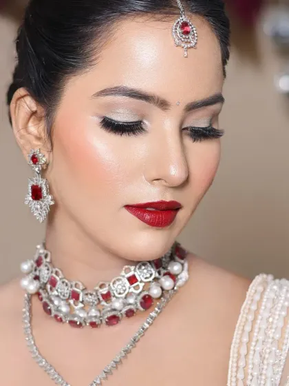 Another close-up of the eye makeup, showing the clean application of lashes and liner, which are crucial for a polished look.