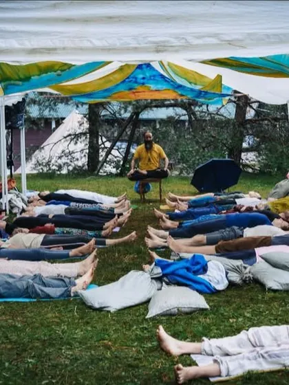 Here you see a Group Sound Bath, where participants lie down and let the healing sounds of singing bowls and gongs wash over them. In these sessions, we create a shared space of tranquility, allowing the collective energy to deepen the meditative and healing experience for everyone involved.