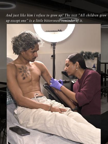 "The text 'All children grow up except one' is a little bittersweet reminder of it." The artist carefully inking the delicate details of the Lost Boys.