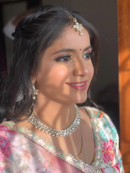 Another angle of the Haldi look, capturing the beautiful light and her radiant smile.