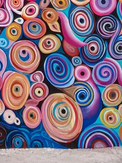 A final detail shot of the vibrant, swirling patterns from the Shishaverse cafe project.