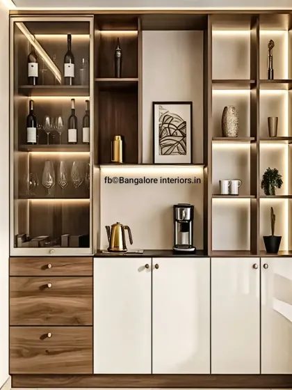 This crockery and bar unit was custom-designed to be a centerpiece for entertaining. It features a mix of wood and white gloss finishes, glass-front cabinets for displaying glassware, and integrated backlighting to highlight decorative items and create a sophisticated look.