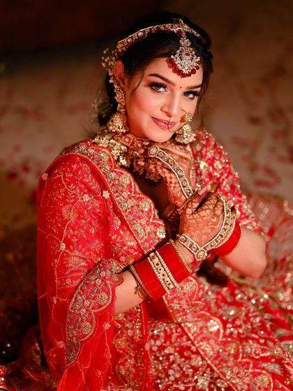 A playful and coy bridal portrait, capturing the bride's personality and charm.