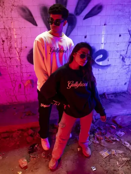This image demonstrates my approach to urban streetwear photography. By using bold, contrasting colored lights and a gritty location, I create a dynamic and energetic vibe that makes the apparel feel current and authentic.