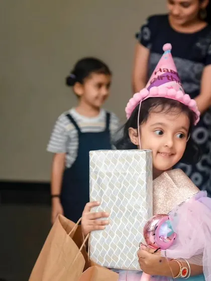 The excitement of receiving a birthday present. We capture the anticipation and happiness of these special moments.