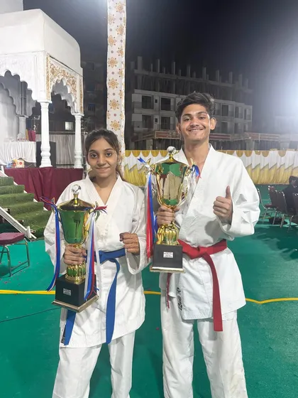 A proud moment for our dojo. My students Taran and Shifa holding their Grand Championship trophies after a tough kumite competition. Their victory is a result of countless hours of dedicated training and fighting spirit.