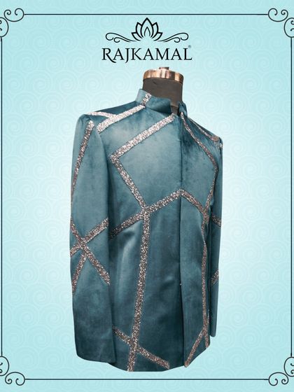 Another view of the teal velvet jacket, showing the full pattern of the sequin work.