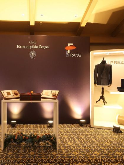The event space for our exclusive evening with Ermenegildo Zegna, featuring displays of their 'I Preziosi' fabric collection and our branding, setting a tone of luxury and exclusivity.