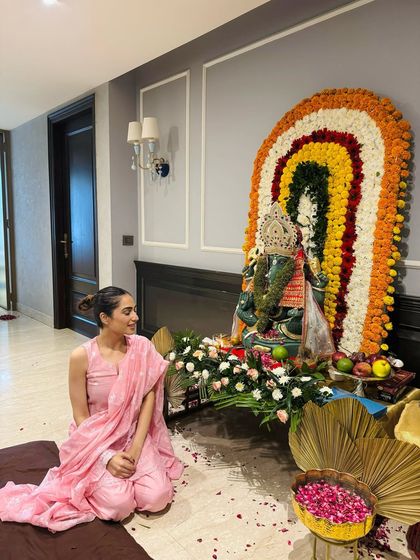 A candid moment beside our beautiful Ganpati decoration. My goal for festive home-wear is always comfort paired with grace.